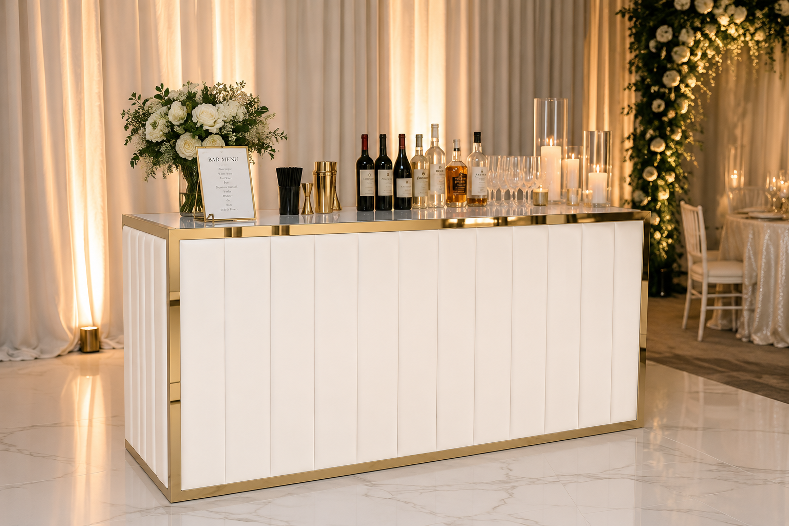 Velvet portable bar rental Chicago — white velvet gold frame bar styled at wedding with floral arrangement and bar menu