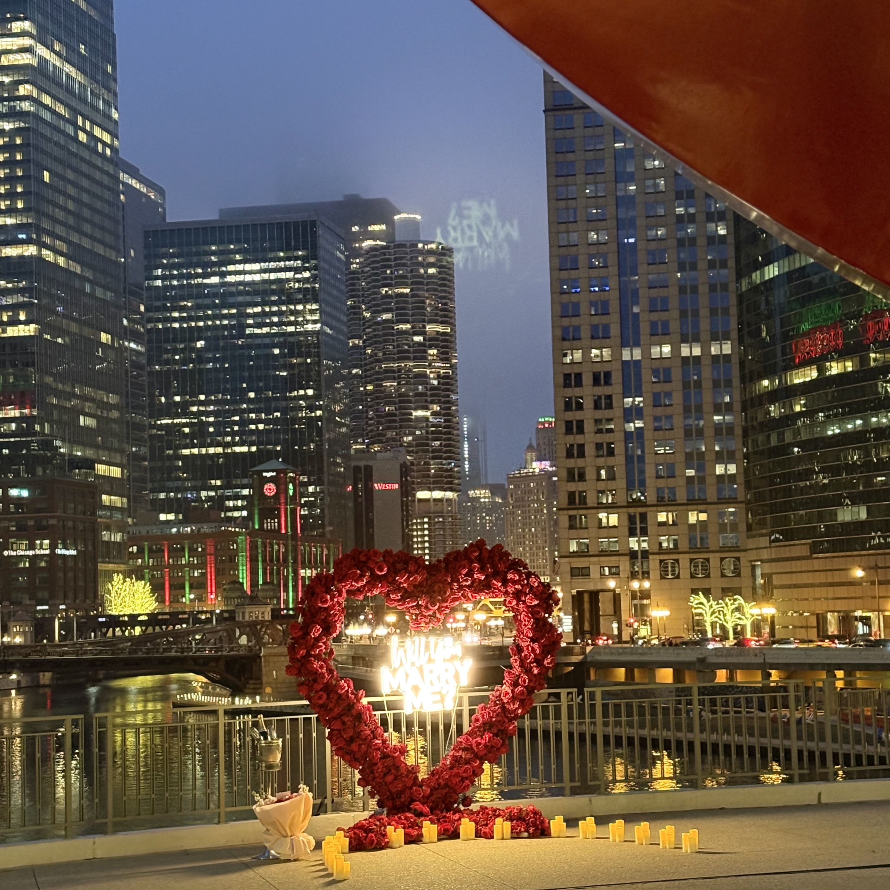 Proposal set up rental Chicago — candle and rose arrangement package for romantic indoor proposal