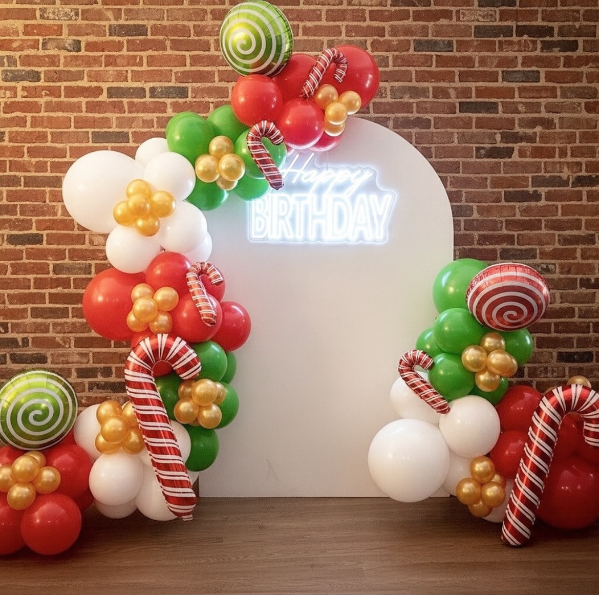 Aurora IL balloon arch holiday Christmas candy themed birthday party