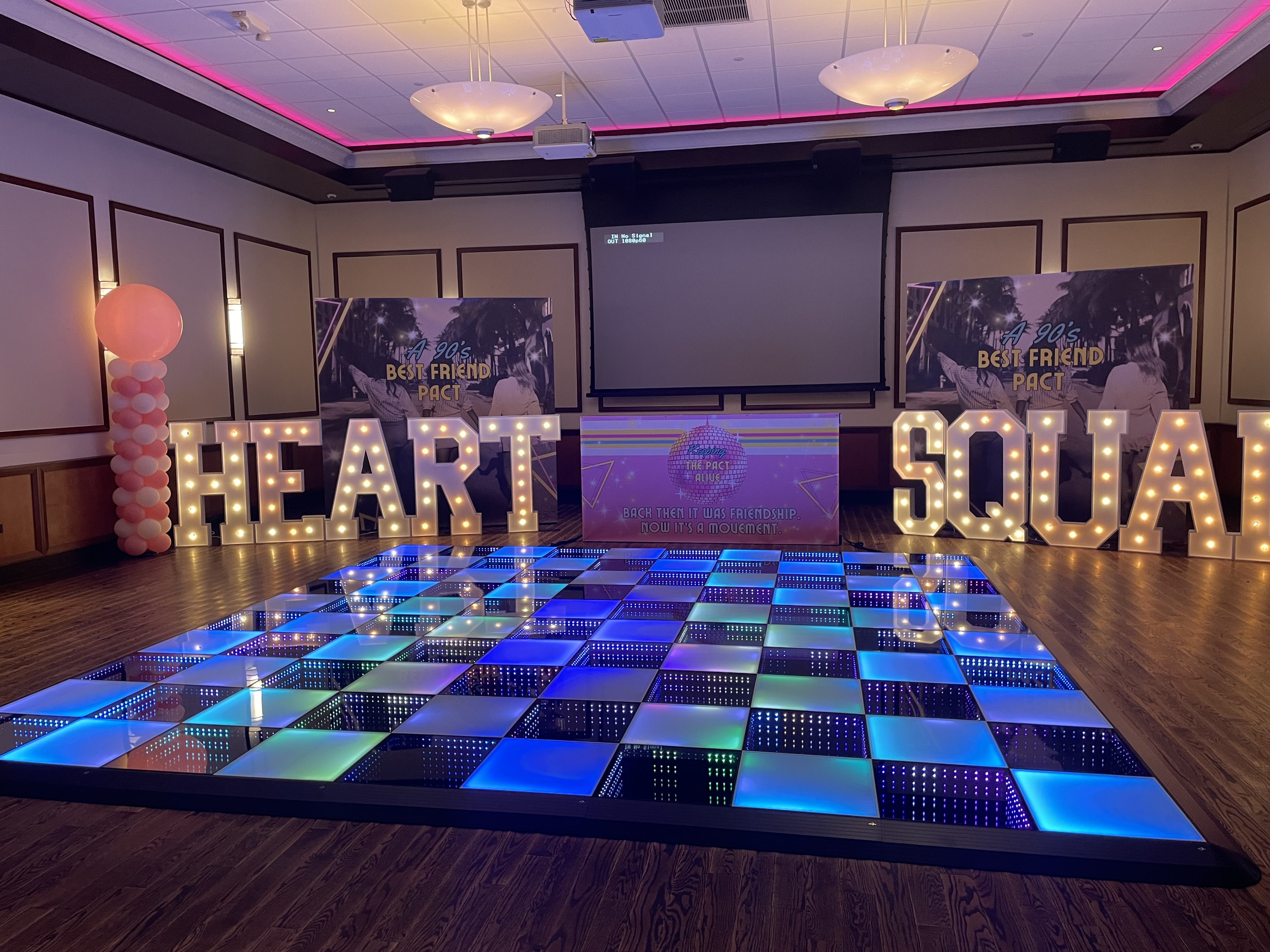 LED dance floor rental Chicago blue glow with marquee letters