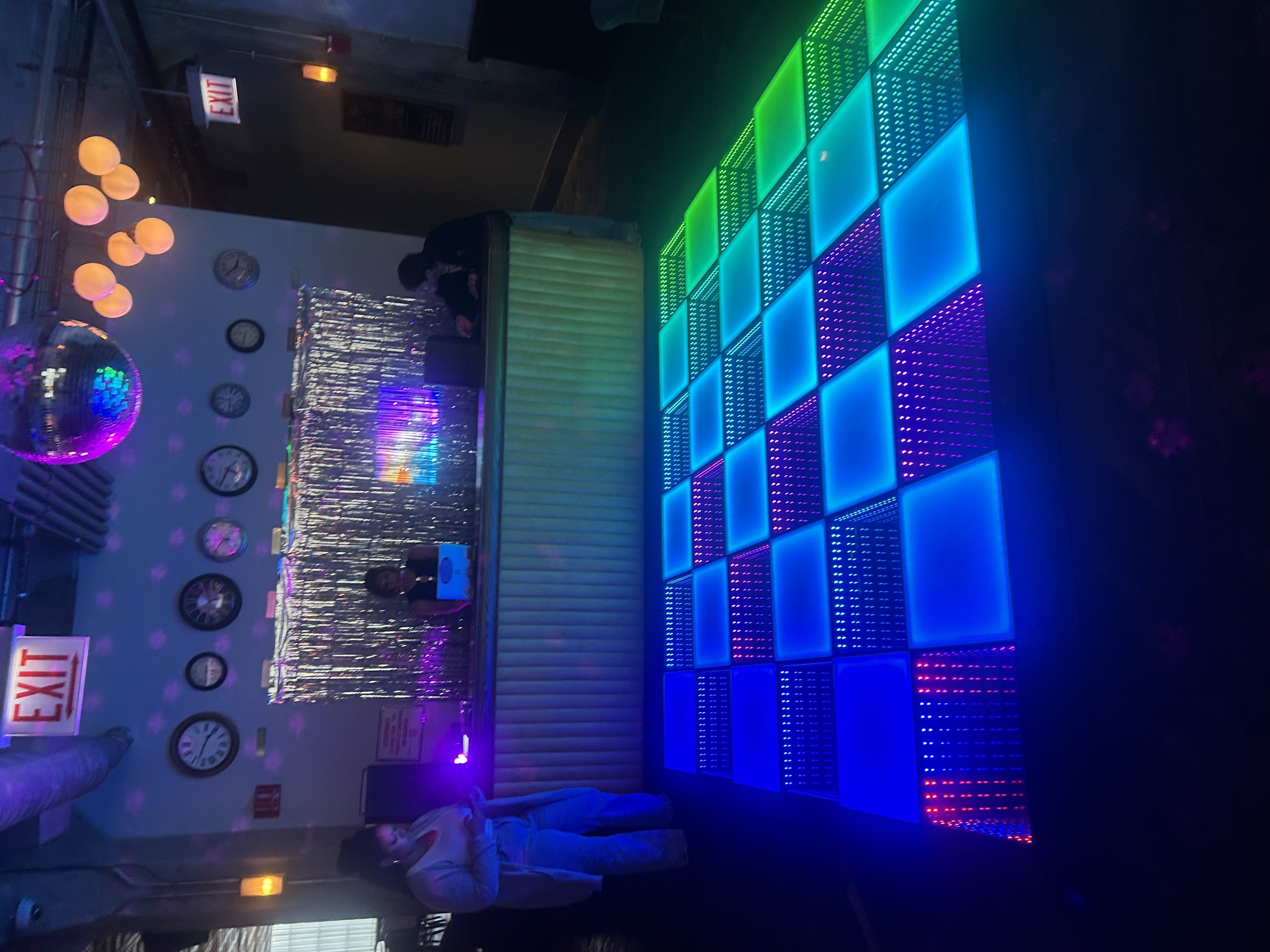 10x10 LED dance floor rental Chicago — multicolor infinity glow with disco ball at nightclub event