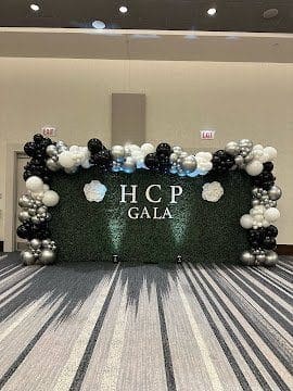 Hedge wall rental Chicago IL corporate gala balloon arch backdrop