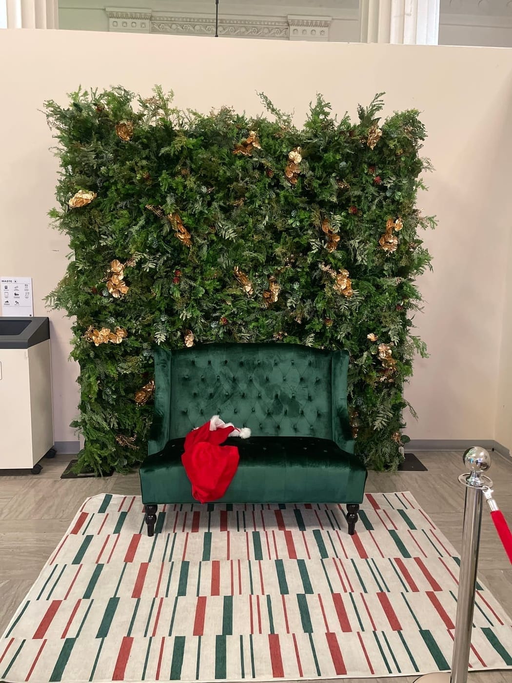 Greenery and gold accent flower wall backdrop rental in Naperville, Illinois