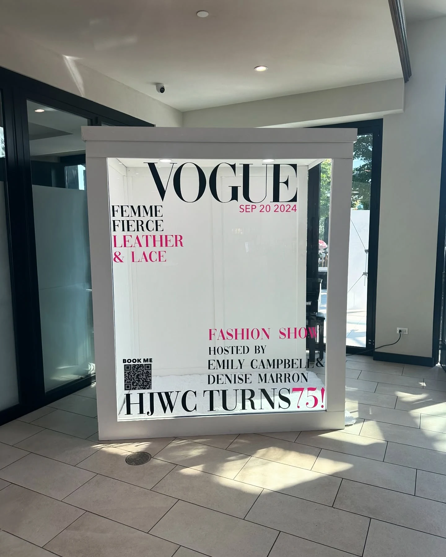 Magazine photo booth rental in Burr Ridge — white magazine cover photo booth for the Hinsdale Junior Woman's Club fashion show at Pella Signature, cover dated September 20, 2024